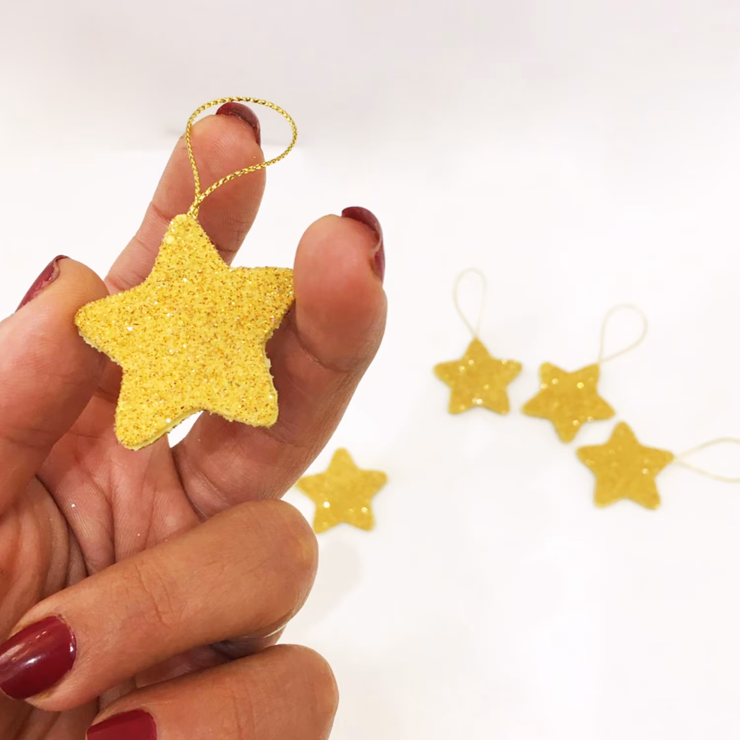 آویز دکوری مدل ستاره طلایی جنس فوم اکلیلی بسته 10 عددی 