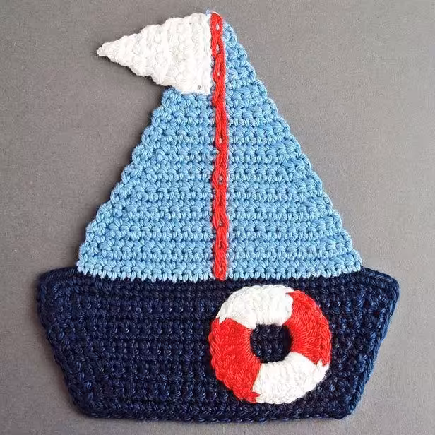 جادعایی و گیفت نوزاد طرح قایق دست بافت جاکلیدی آویز اپلیکه قایق
