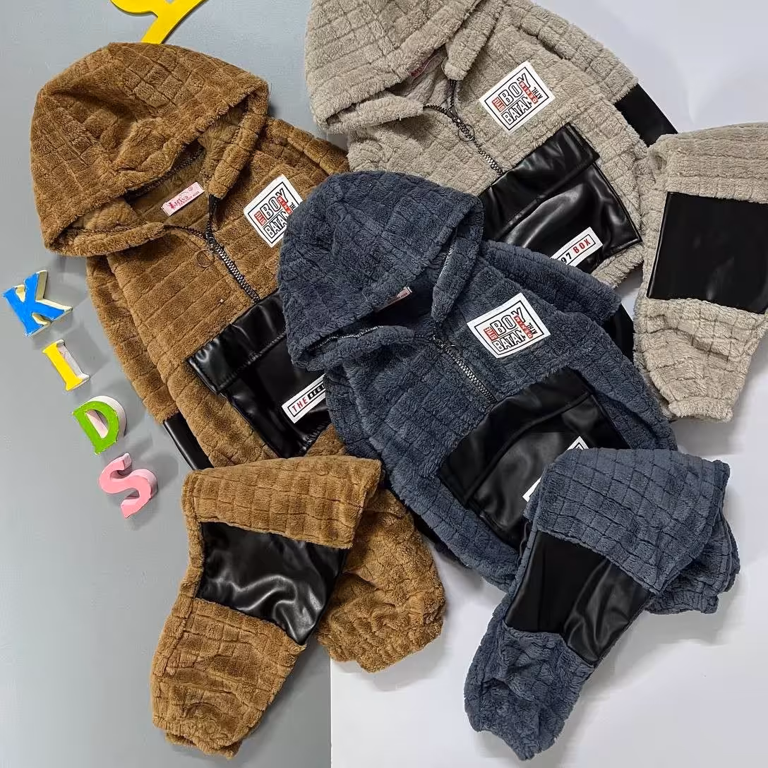 ست هودی و شلوار اسپورت شیک و زیبا جنس پولیشی عالی مناسب حدود سنی 2 تا 9 سال رنگبندی متنوع و جذاب 