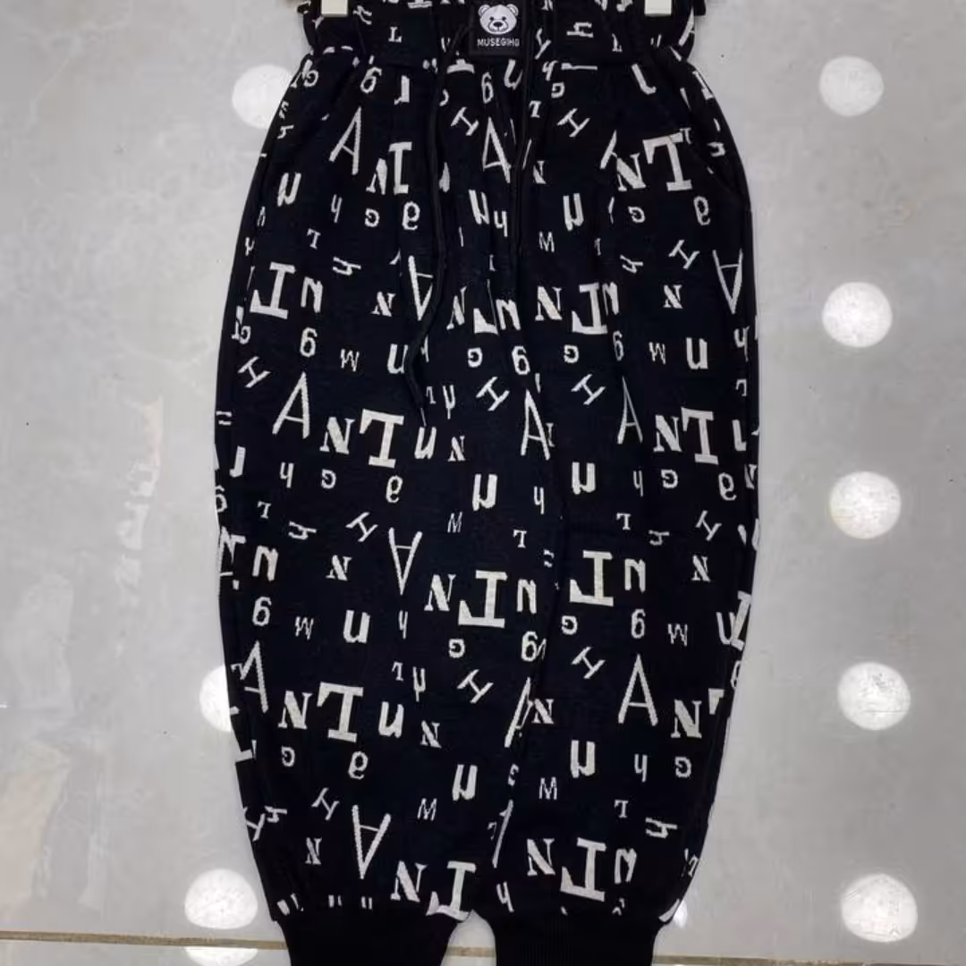 شلوار اسلش بچگانه وارداتی اسپرت حروف انگلیسی 2تا6سال تک رنگ مشکی 