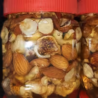 معجون عسل و مغز ها (تمامی عسل های این غرفه گارانتی می‌شود و تضمینی است)