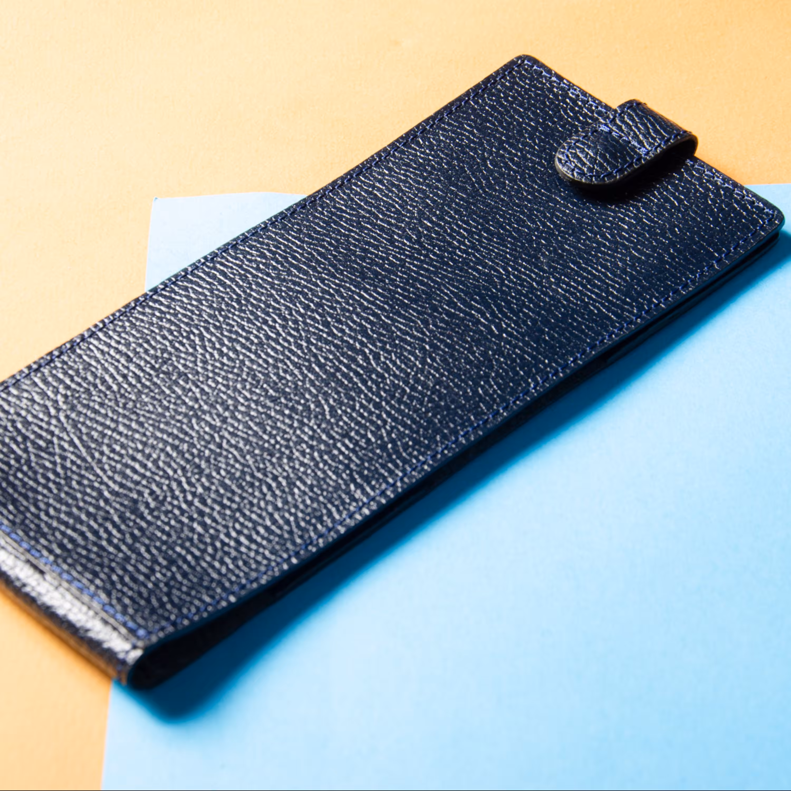 کیف دسته چک  چرم طبیعی فلوتر z3 رنگ سرمه ای