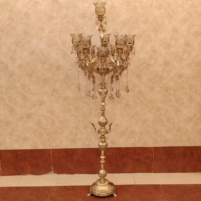 آباژور ایستاده برنز کنار سالنی طرح فرشته پایه گرد 5 شاخه 11 شعله( لوستر برنجی )