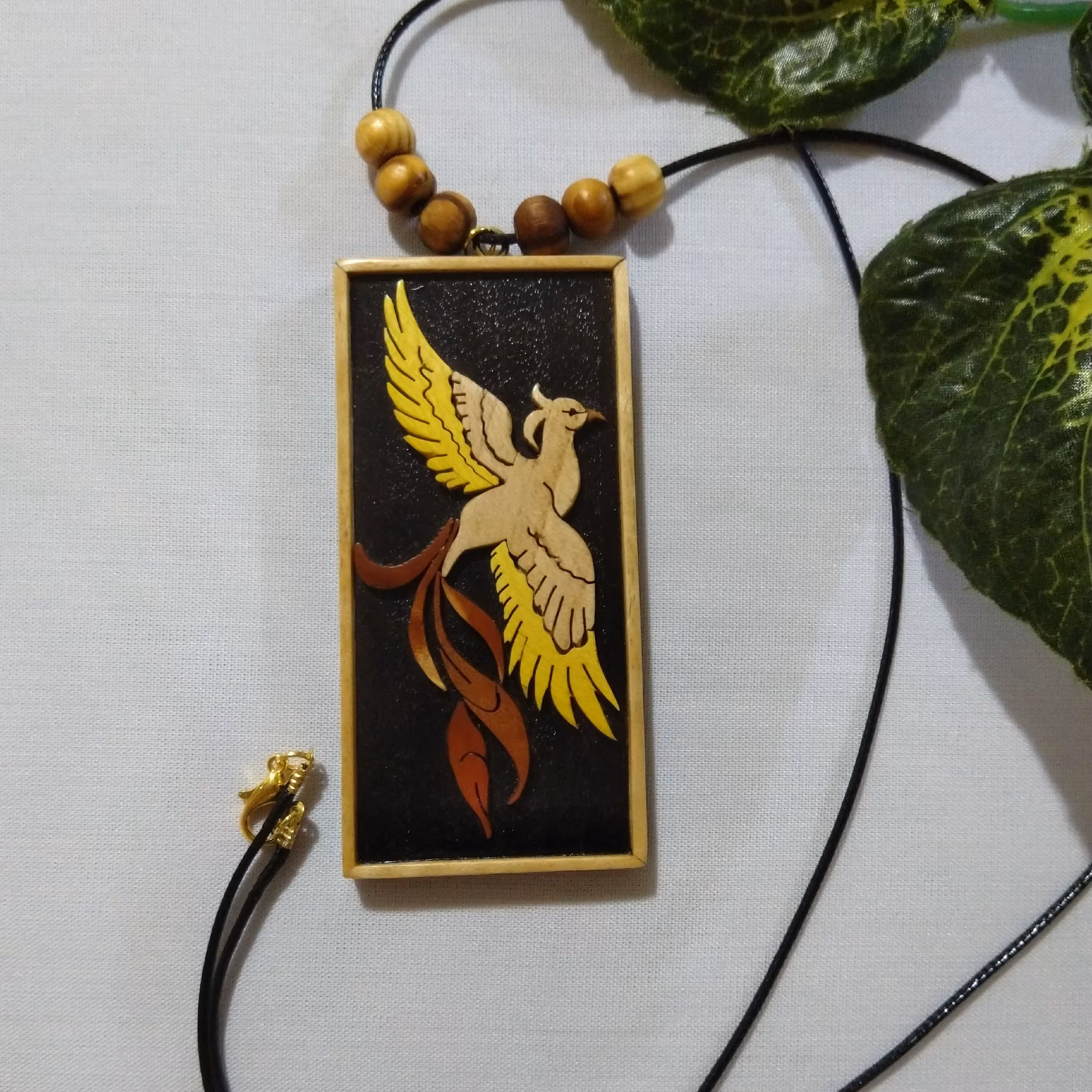  گردنبند چوبی مرغ بهشت