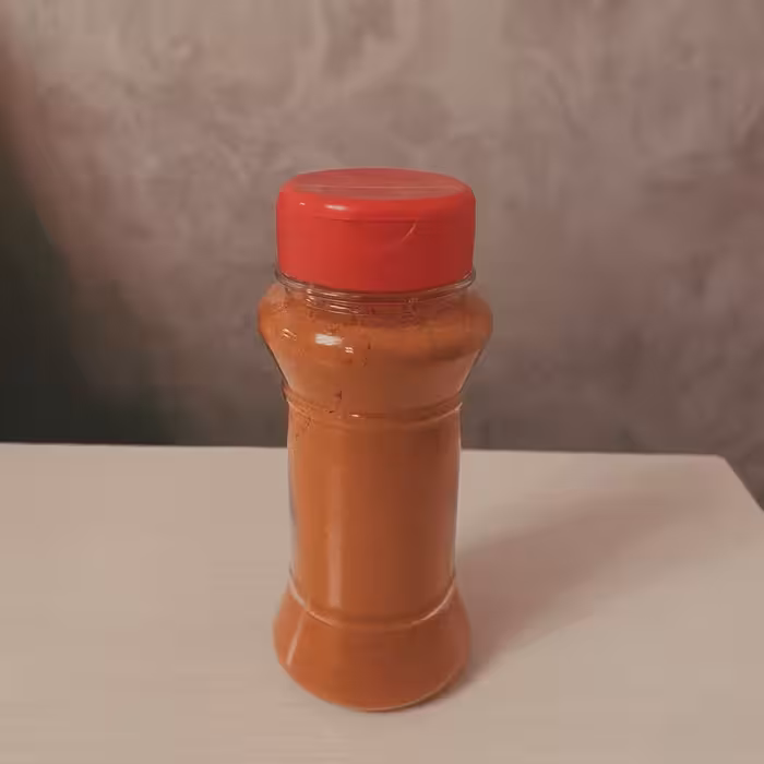 پودر فلفل قرمز اعلا در ظرف نمک پاشی 65 گرمی