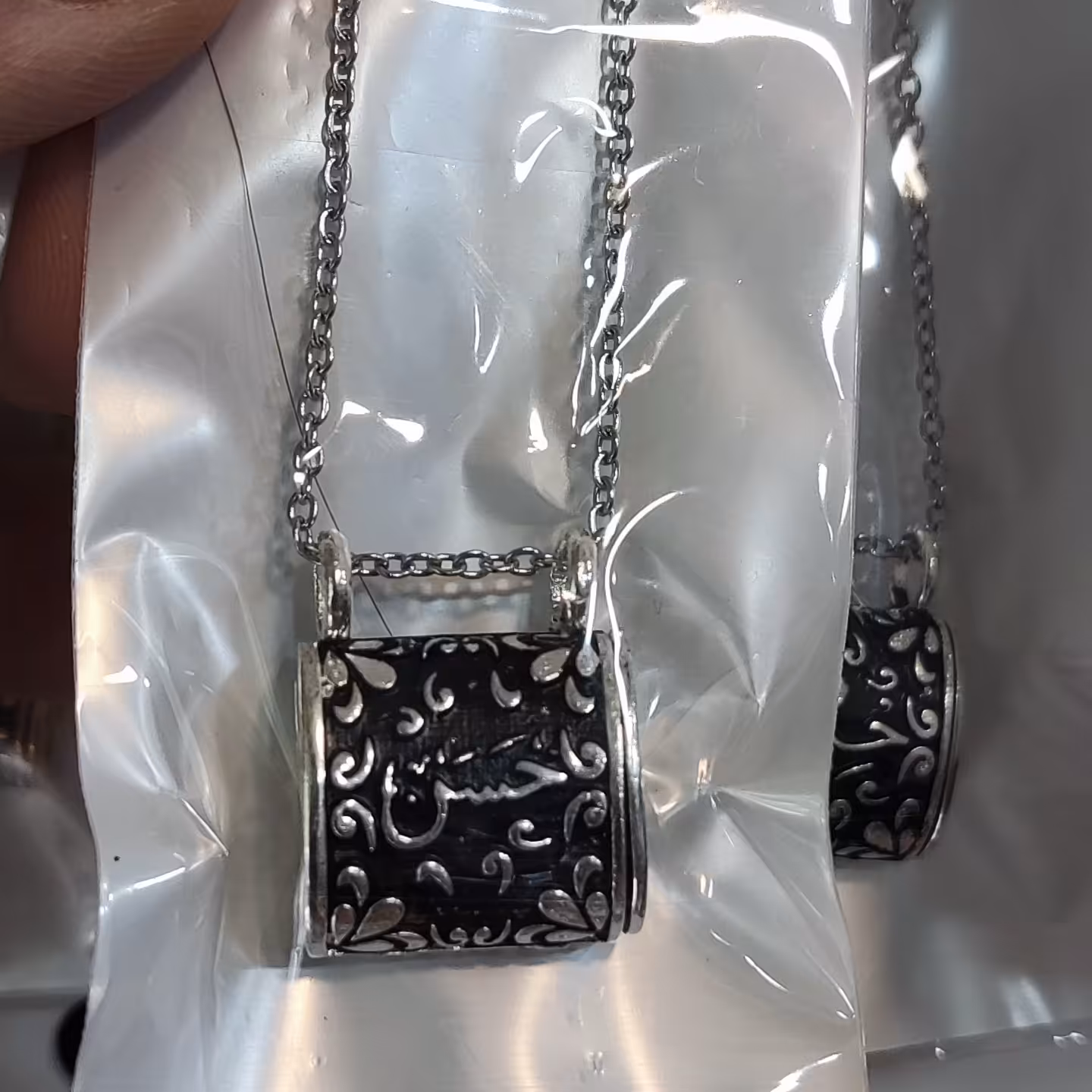 گردنبند حرز امام جواد(ع) همراه با زنجیر دیپلمات استیل45سانتی رنگ ثابت طرح  اسپرت