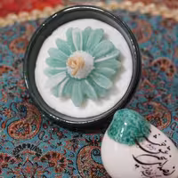 شمع کاسه ای سبز سنتی با گل مارگاریت