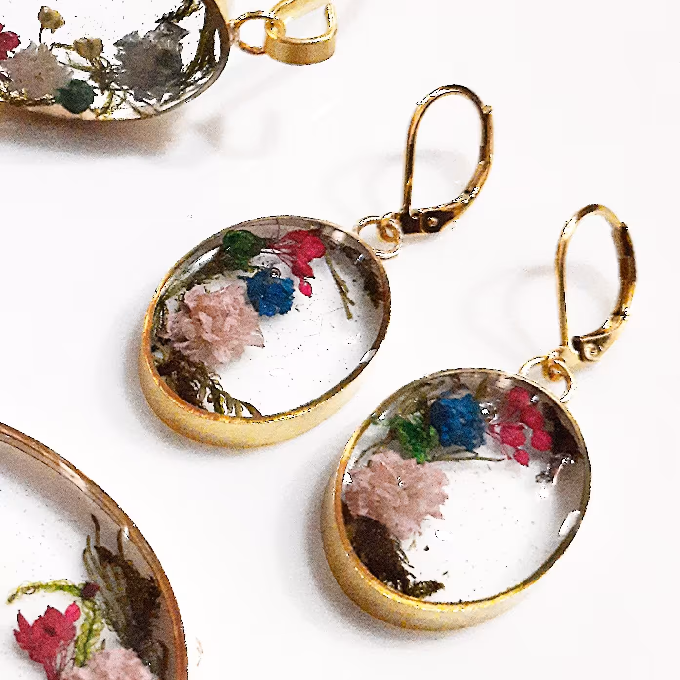 گوشواره شیشه ای گل طبیعی بیضی بدلیجات زیورآلات دستساز آویز استیل آبکاری طلا