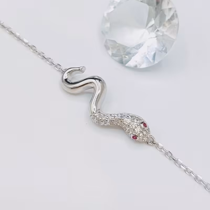 دستبند نقره با روکش طلا سفید  طرح مار   کد 14