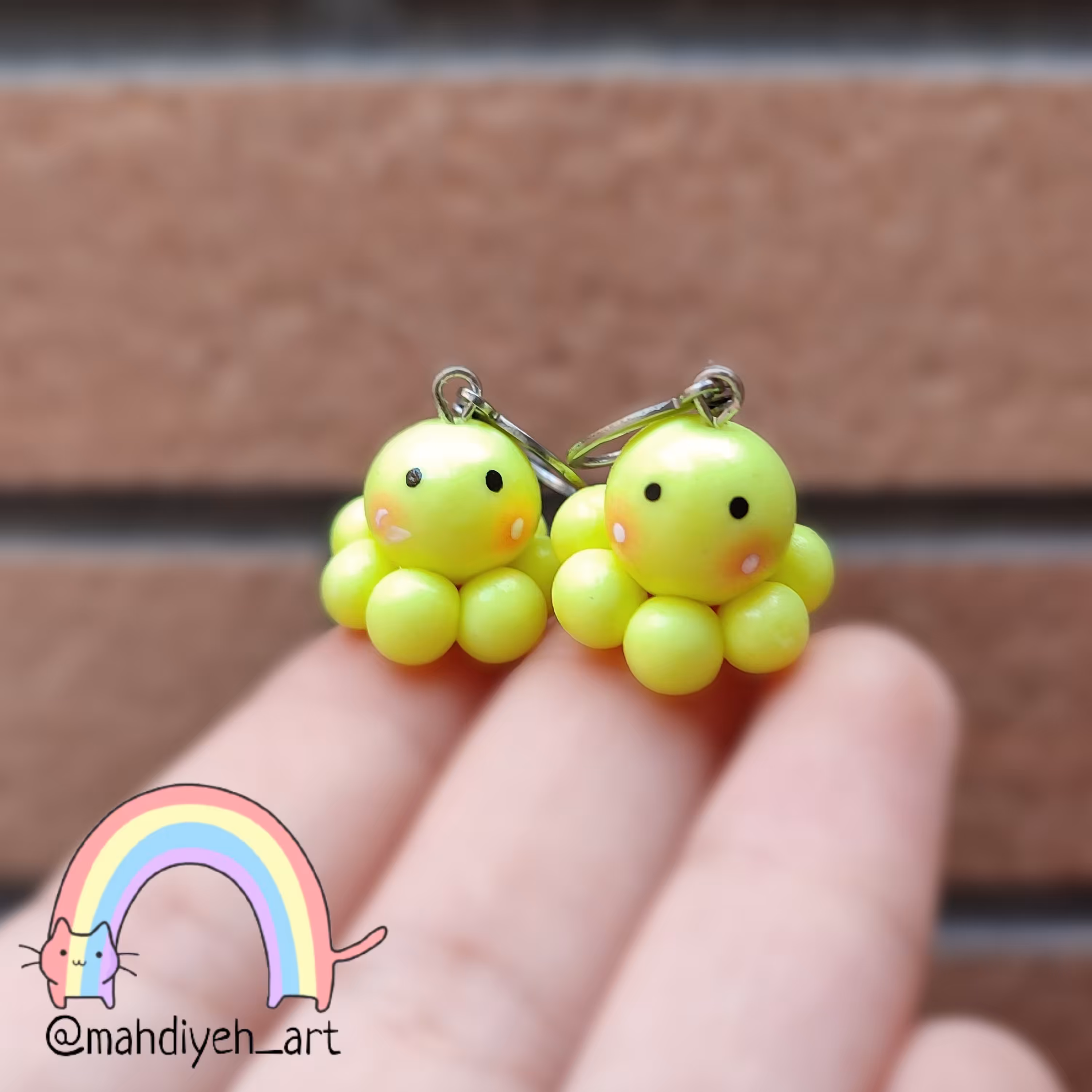 گوشواره فانتزی طرح هشت پا زرد فسفری سبک 