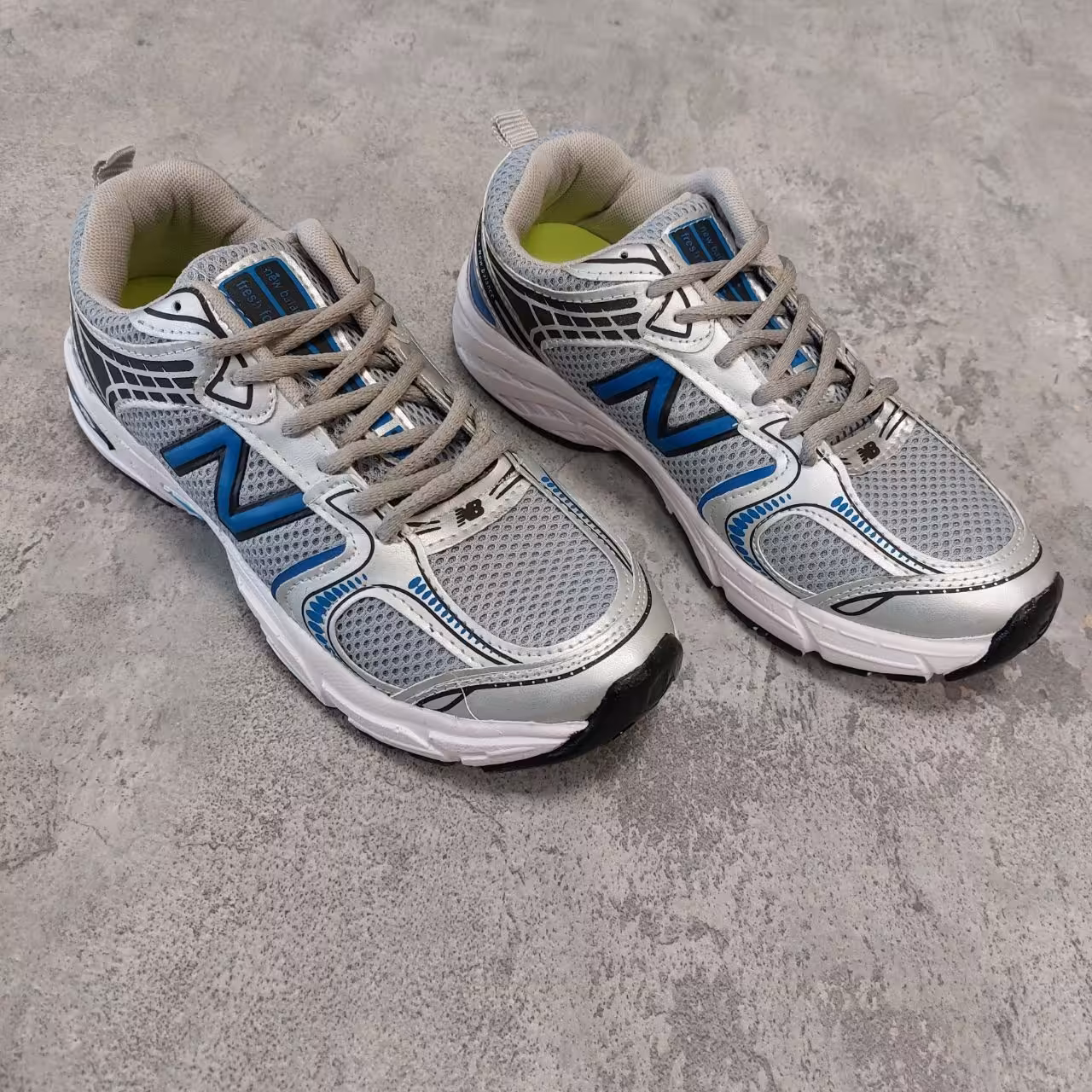 کتانی حرفه ای مردانه مدل ساکونی طوسی آبی بی واسطه نت