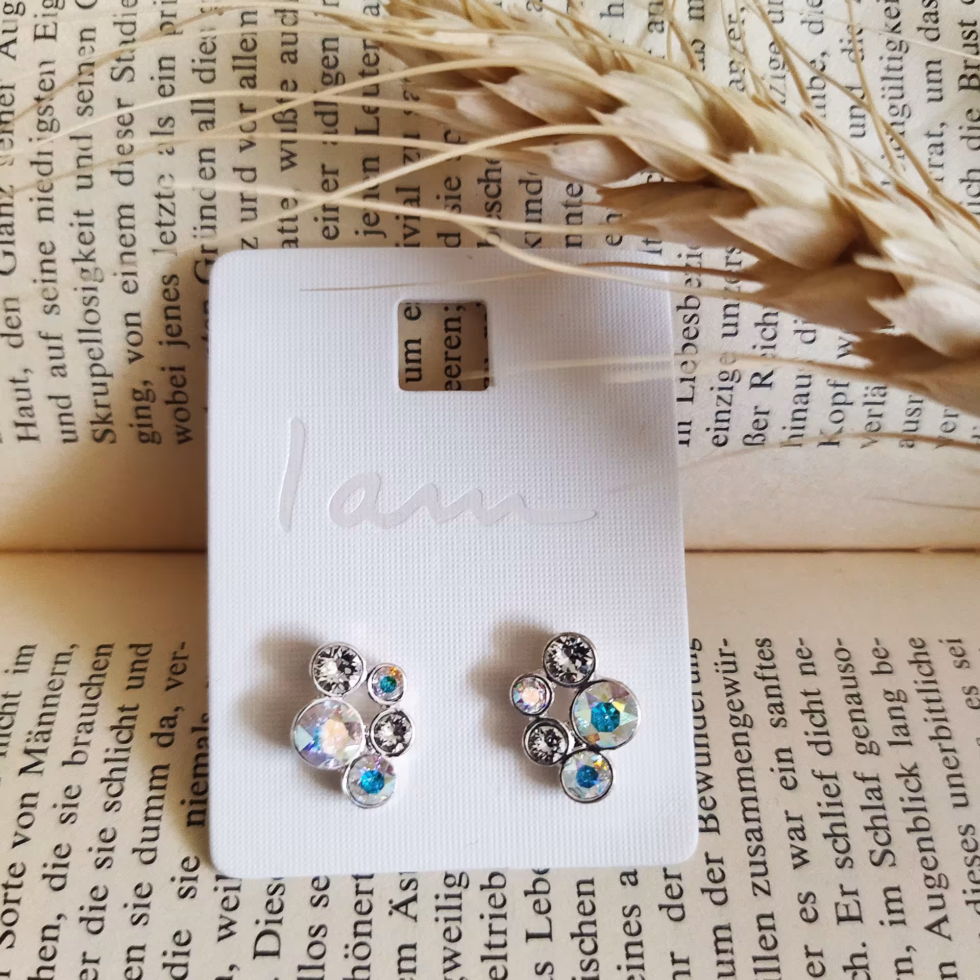 گوشواره با کریستال زیرکنیا هفت رنگ بدلیجات زیورآلات 