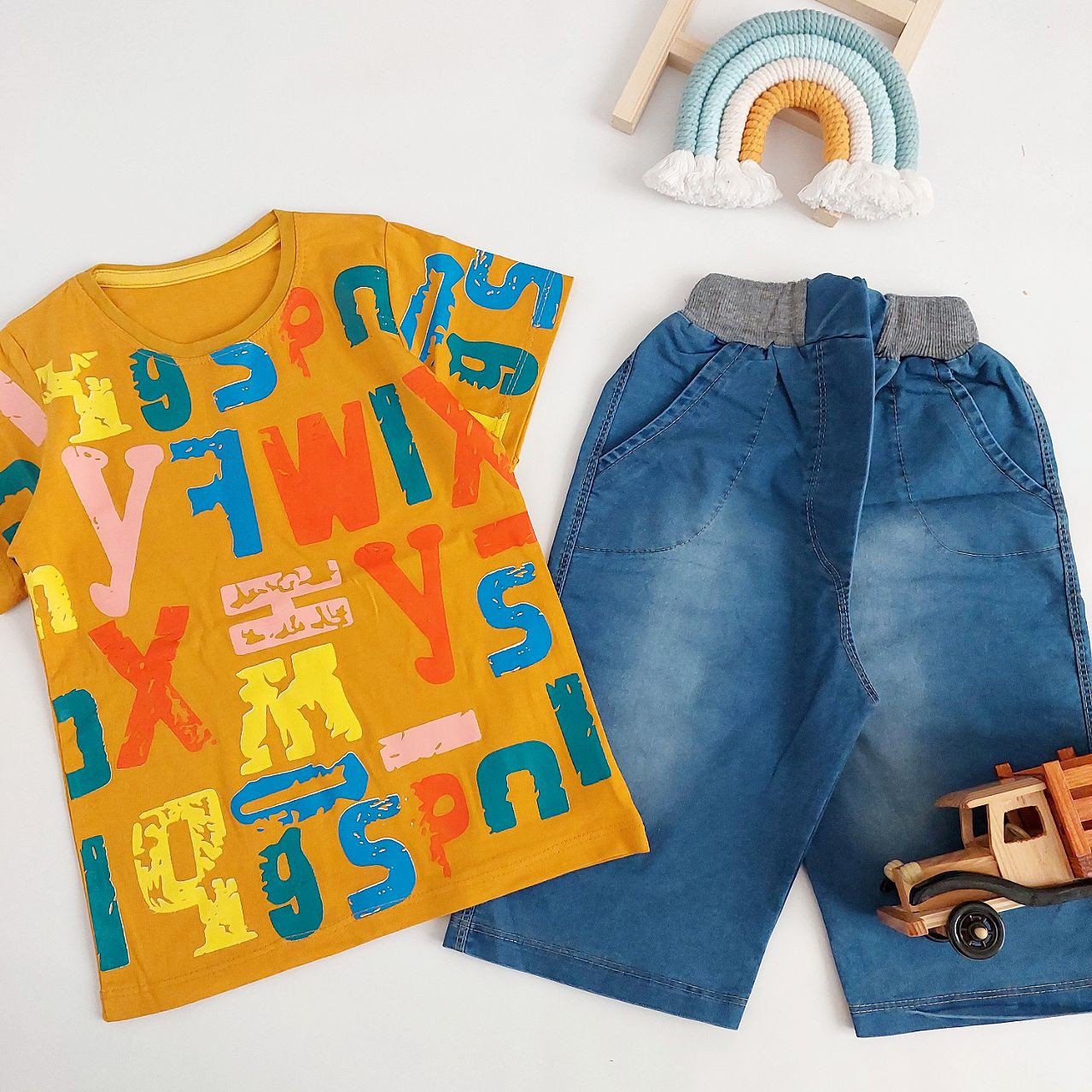 تیشرت و شلوارک لی بیرونی دخترانه و پسرانه طرح لاتین سایز 60 کد 856n