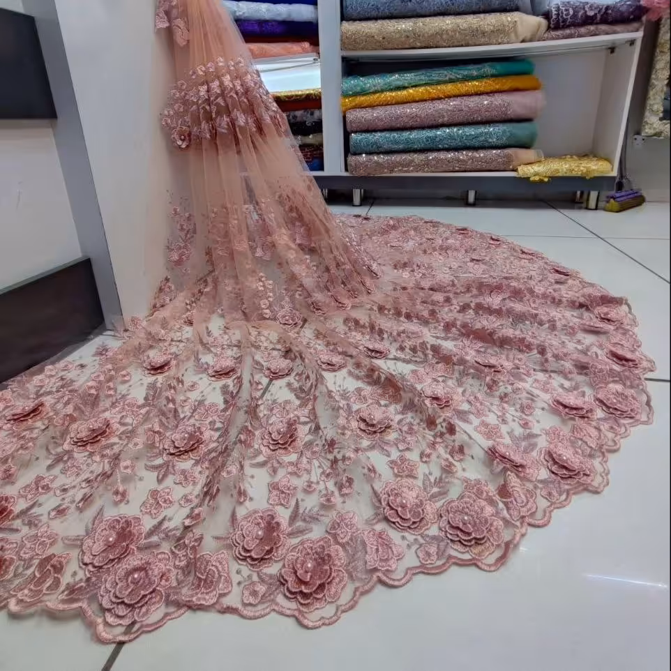 پارچه دانتل گل اپلیکه ای ابریشم دوزی و مروارید پرچی فقط رنگ کالباسی صورتی یک متر و نیم 1