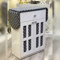 میز اتو و جای چرخ خیاطی 