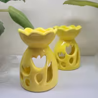 اسانس سوز  لعاب خورده طرح لاله ارتفاع 9سانتیمتر  رنگ زرد