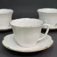 فنجان ونعلبکی چینی لب طلا نیلوفری شرکت مقصود
