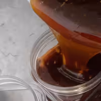 شیره انگور قرمز  ارومیه   غلیظ  مثل عسل  دوشاب انگور قرمز یک کیلو 