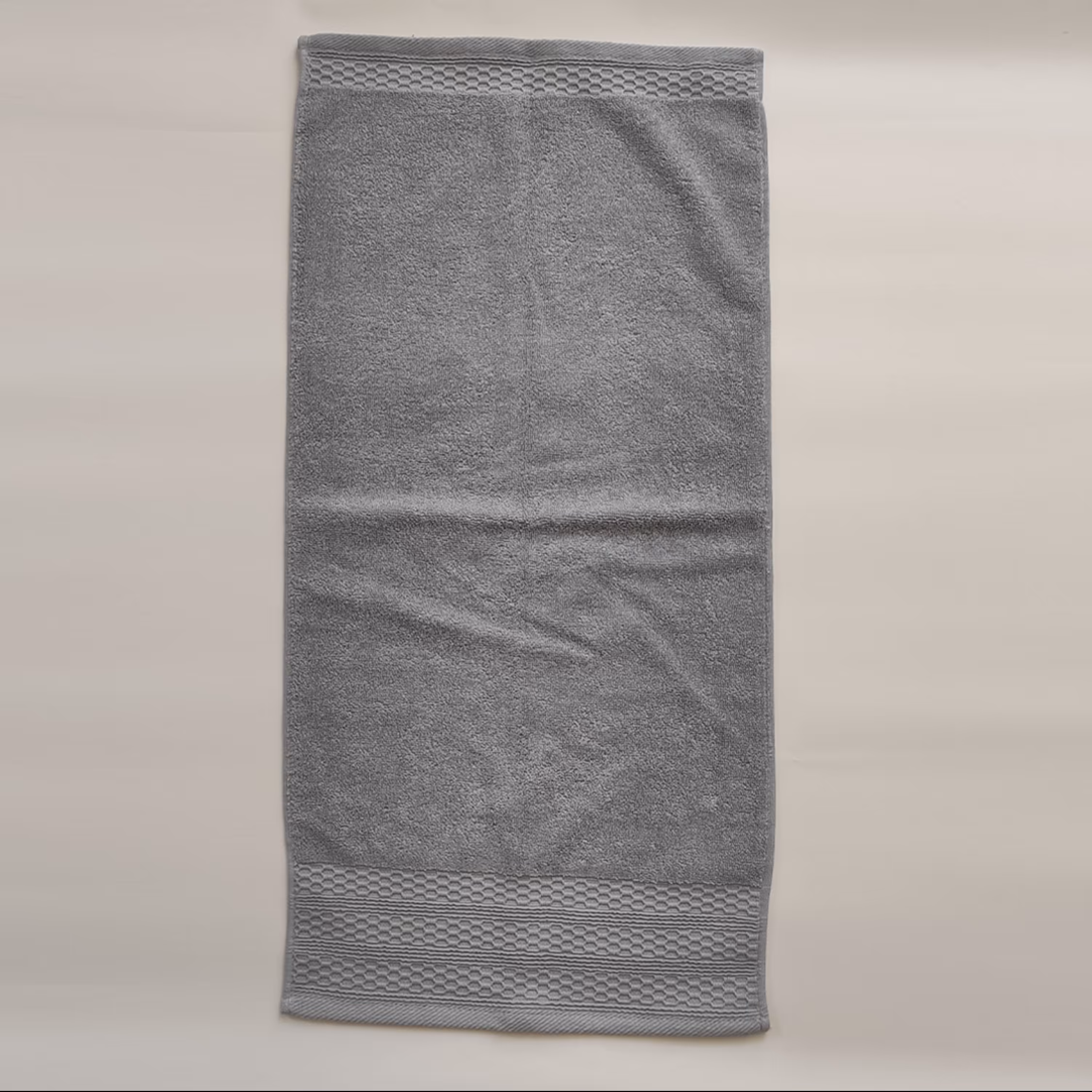 حوله دستی طرح کندو رنگ طوسی روشن مجموعه 2 عددی