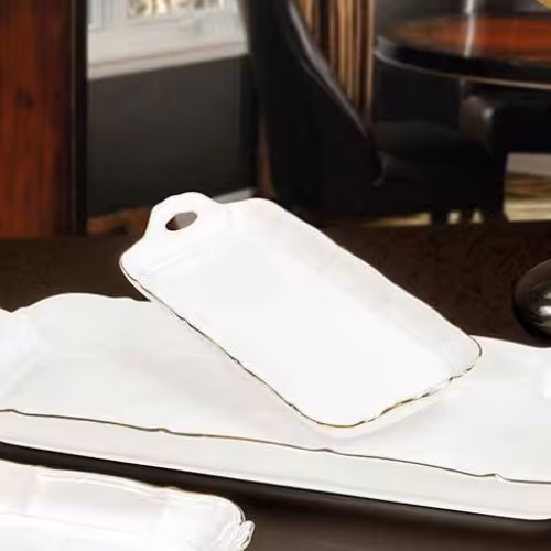 رولت خوری سایز کوچک رنگ سفید لب طلا  جنس چینی برند مقصود