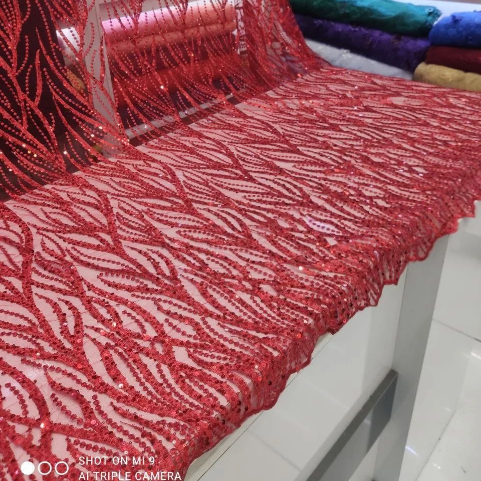 پارچه دانتل فرانسوی پولک دوزی طرح آتشی قواره سه متری