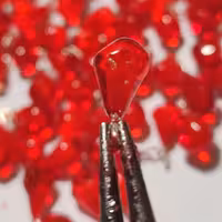 دانه انار تزیینی بسته 100عددی پایه نقره ای