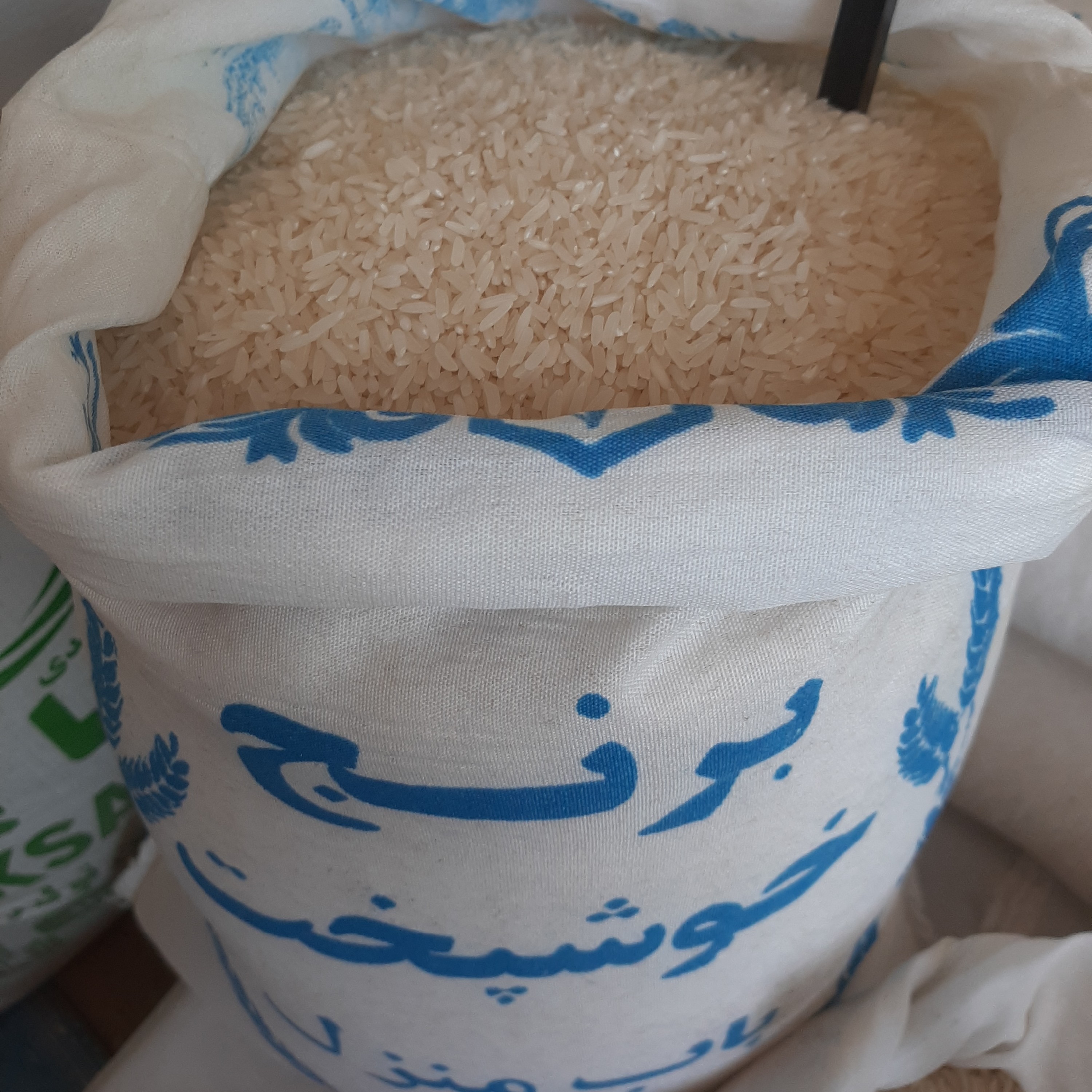 برنج خوشپخت باب منزل در بسته های 10 کیلویی