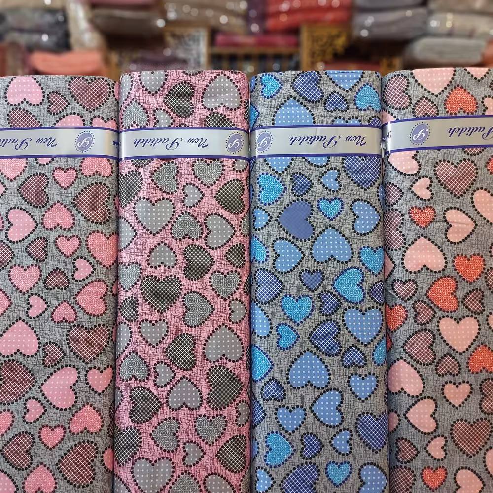 پارچه ملحفه ای طرح قلب پدیده نو طوسی ملحفه سرای رزاق