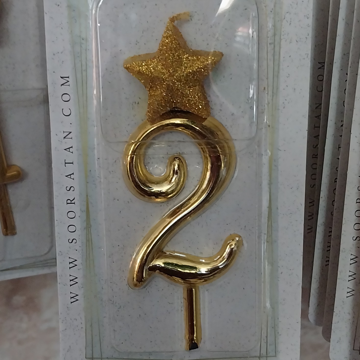 شمع تاج دار  و ستاره دار طلایی عدد 2