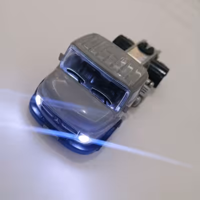 ماشین فلزی خاور بنز موزیکال و چراغدار و قدرتی رنگ خاکستری