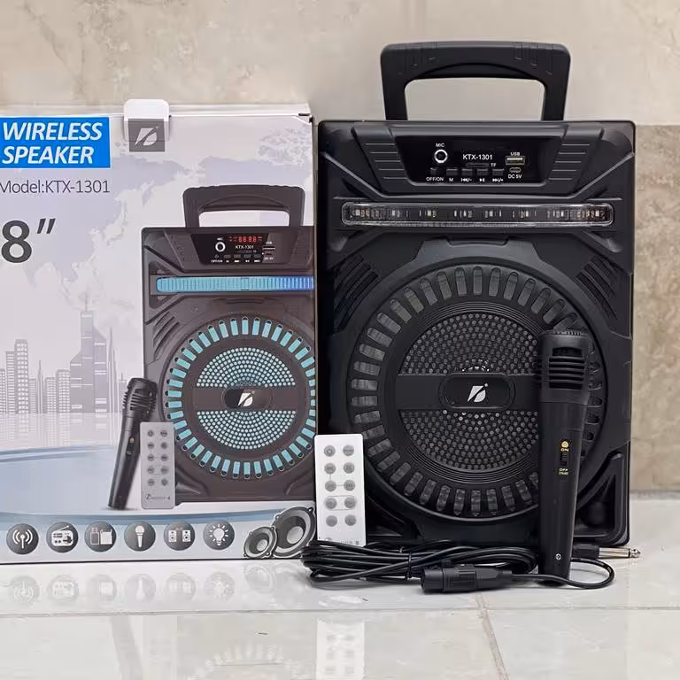 اسپیکر بلوتوثی KTX-1301 همراه با میکروفون و ریموت با کیفیت عالی ارسال رایگان