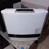 بخاری گازی برقی ژاپنی توان 5.800کالری مجهز به یون ساز پایه چرخشی سخنگو تمام فول 