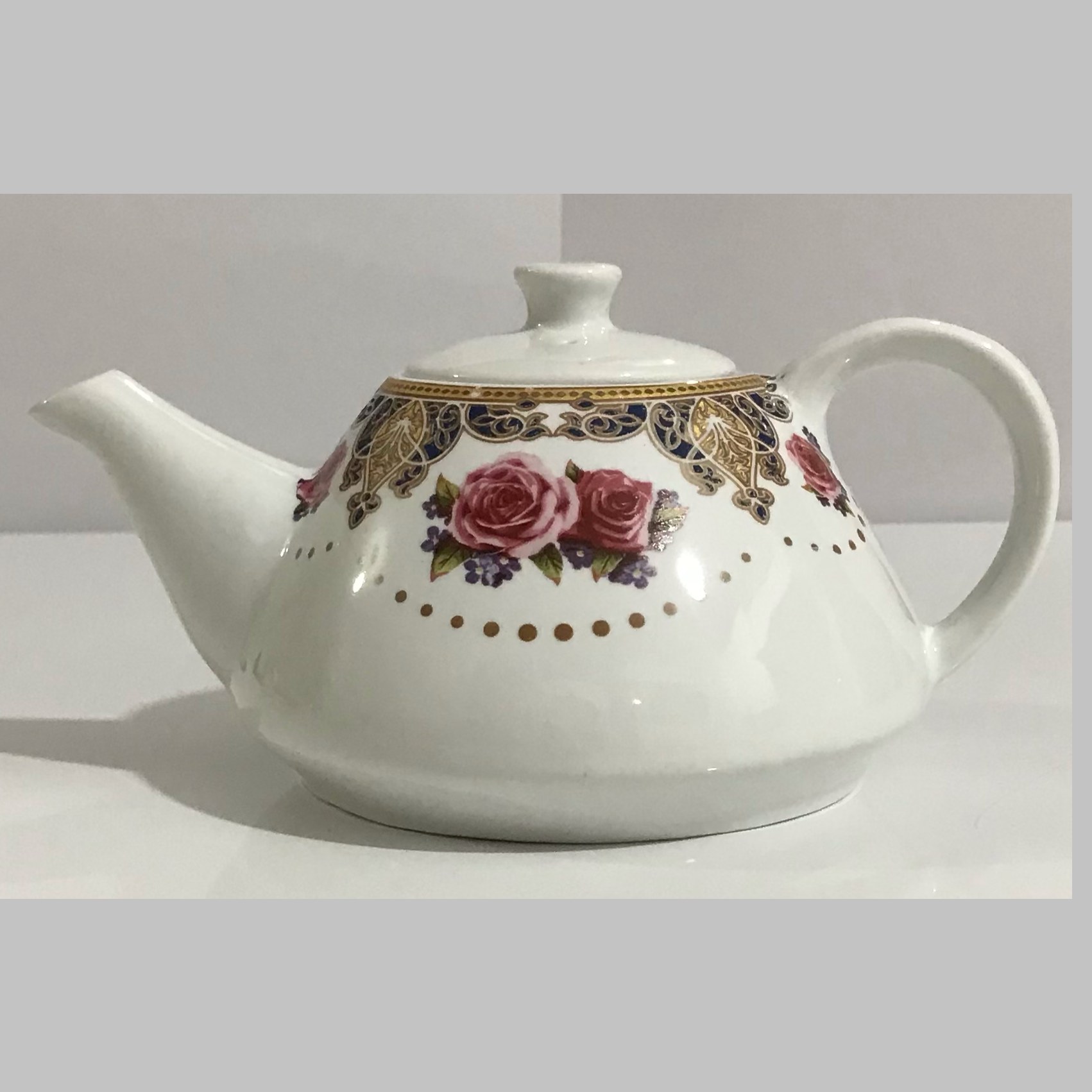 قوری چینی (روکتری) مدل کسری طرح ارکید( اندازه متوسط)- از تولید به مصرف