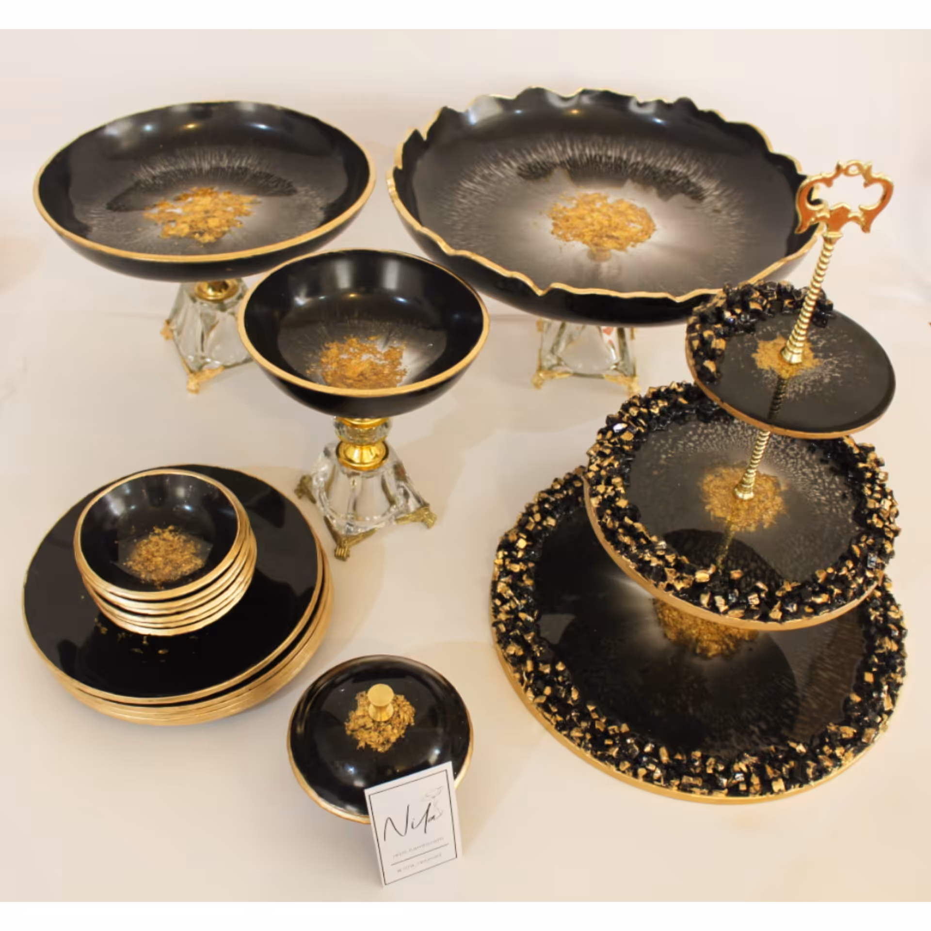 سرویس پذیرایی مشکی طلایی خاص شیک رزینی شامل میوه خوری آجیل خوری شکلات خوری شیرینی خوری پیاله پیش دستی رزینی کار دست