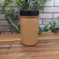 کره بادام زمینی صددرصدخالص و طبیعی بدون موادافزودنی(نیم کیلویی) 