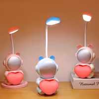 چراغ مطالعه جاقلمی دار طرح فضانورد و قلب