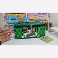 جامدادی  سه زیپه چرم طرحدار عروسکی به  صورت تک و عمده 