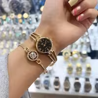 ست ساعت و دستبند زنانه طلایی مجلسی