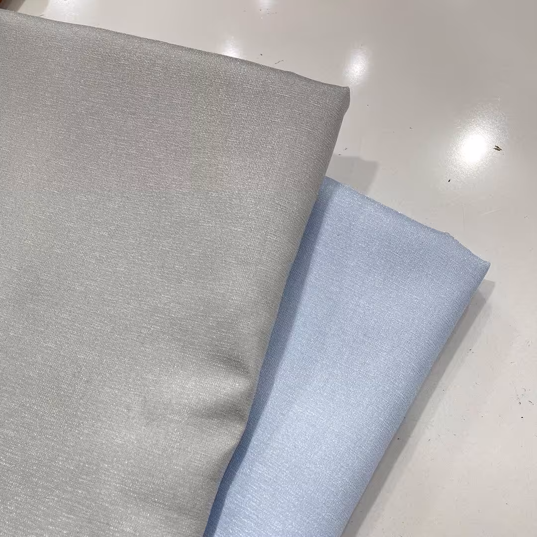 پارچه ی شانتون شاین شانتون براق  7 مناسب برای مانتو و کت و شلوار و  پیراهن بچگانه و مجلسی 