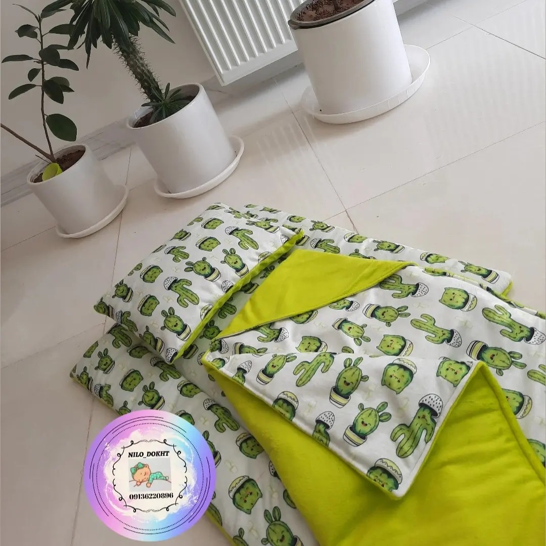 ست خواب نوزادی کاکتوسی نیلو دوخت که شامل متکا،تشک ،پتو دور پیچ میشه با رنگ خاص سبز