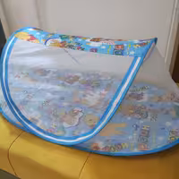 پشه بند کودک  مدل قایقی دو رنگ آبی و صورتی