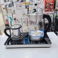 چاییساز کنارهمی مودکس انگلستان  دارای صفحه لمسی توان 2200 وات جنس کتری و قوری از پیرکس دارای نور ال ای دی آبی رنگ 