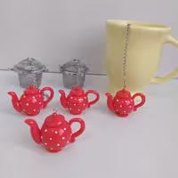 آویز صافی چای و دمنوش  طرح قوری بدون صافی استیل میباشد