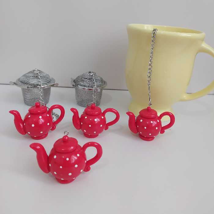 آویز صافی چای و دمنوش  طرح قوری بدون صافی استیل میباشد