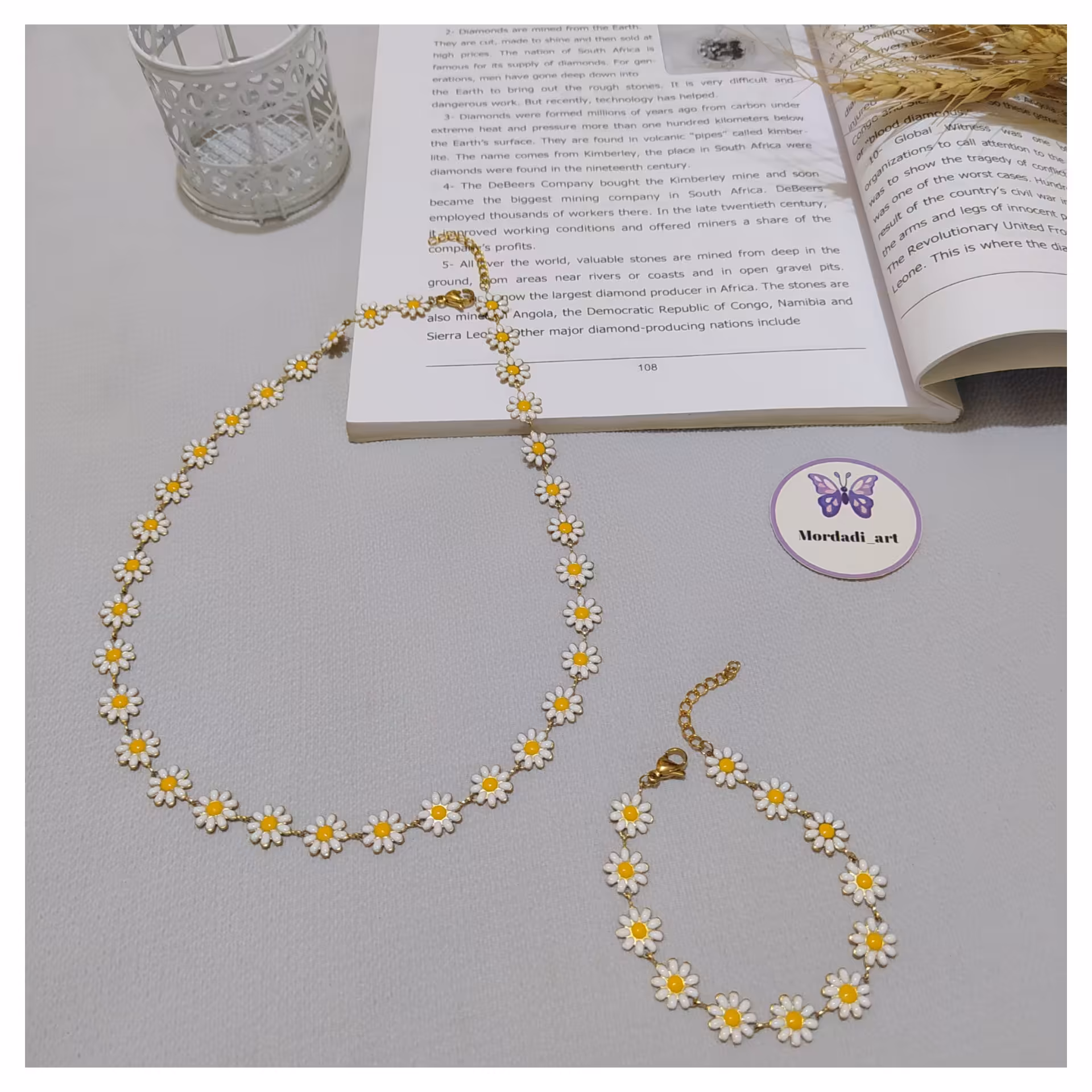 نیمست دستبند و گردنبند بابونه استیل