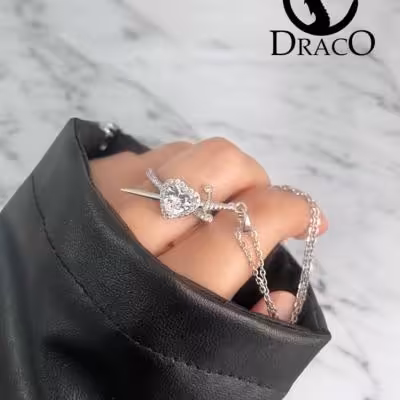 ست انگشتر قلب جواهری و گردنبند شمشیر استیل