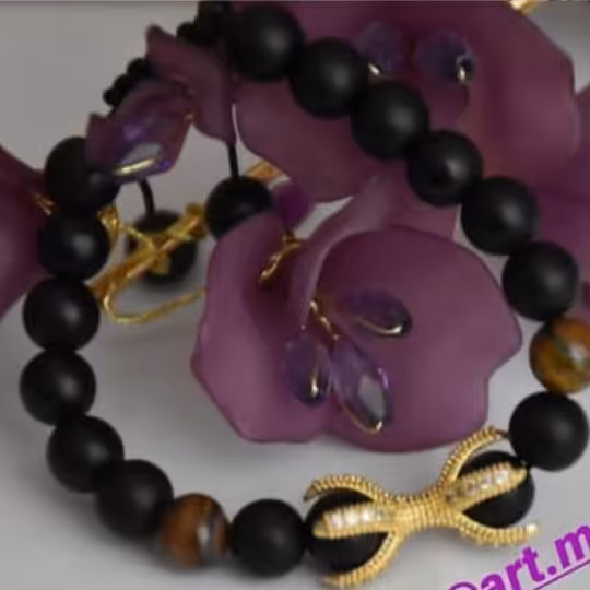 دستبند زنانه و مردانه اسپرت اونیکس و سنگ چشم ببر رنگ ثابت دست ساز نیل