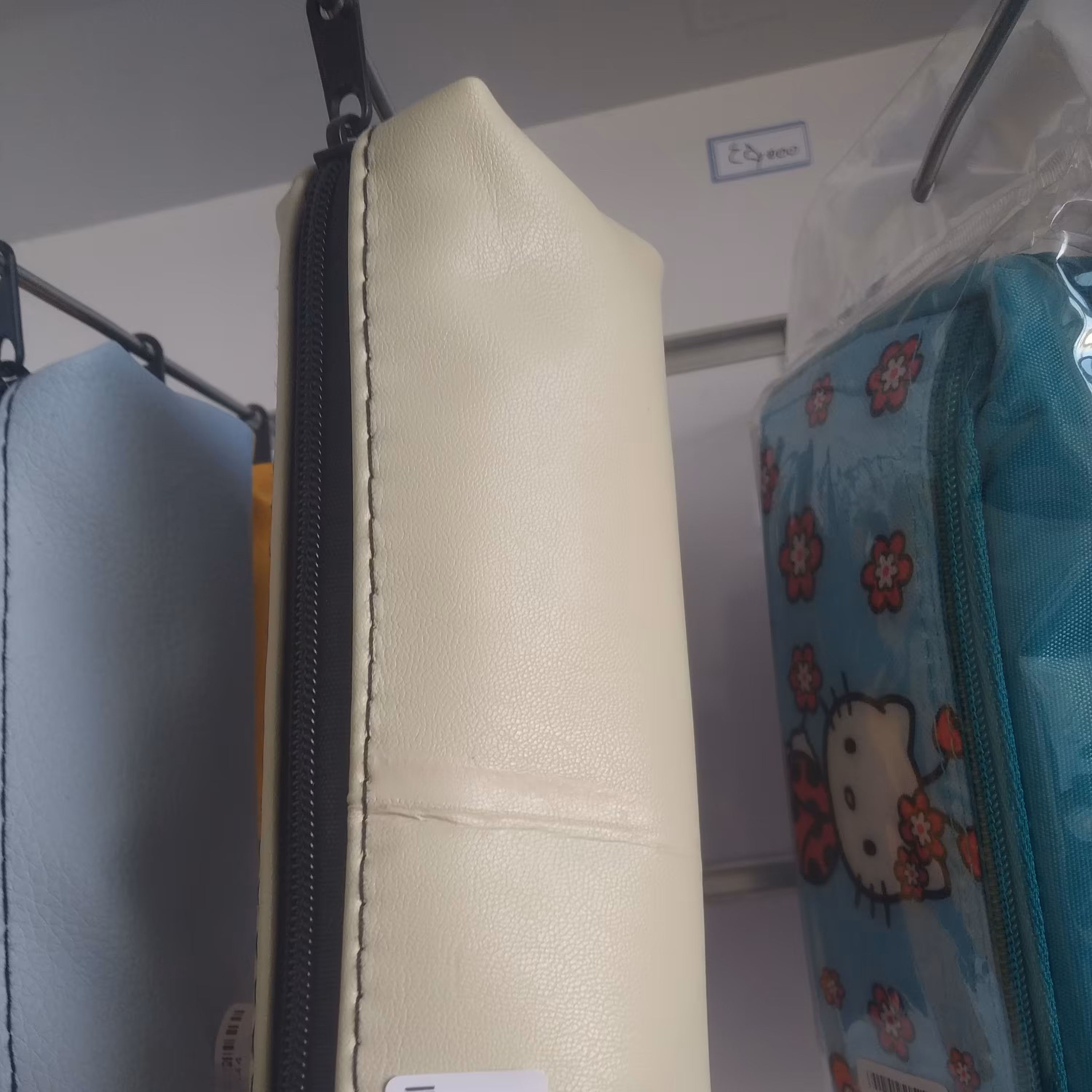 جا مدادی  تک زیپ چرم رنگ کرم 