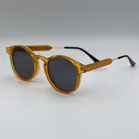 عینک افتابی زنانه ومردانه مارک جنتل مانستر ( رنگ عسلی)