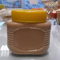 ارده اعلا 400 گرمی با کنجد ایرانی بوداده توسط ارده گیر سنگی با سنگ طبیعی